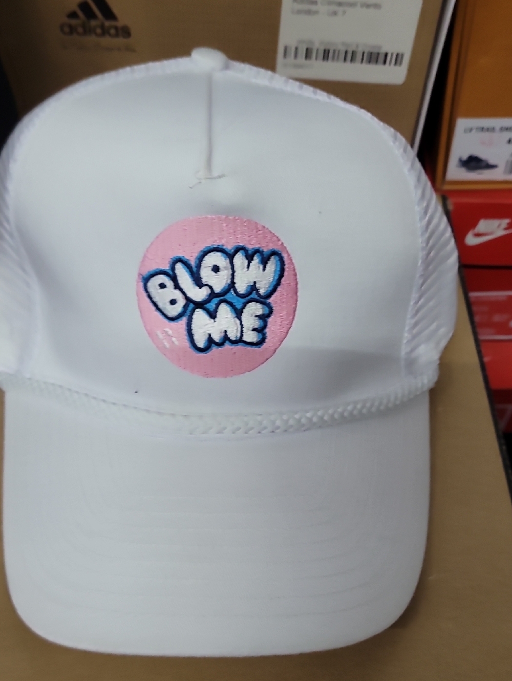 White Trucker Hat with Pink Embroidered Patch